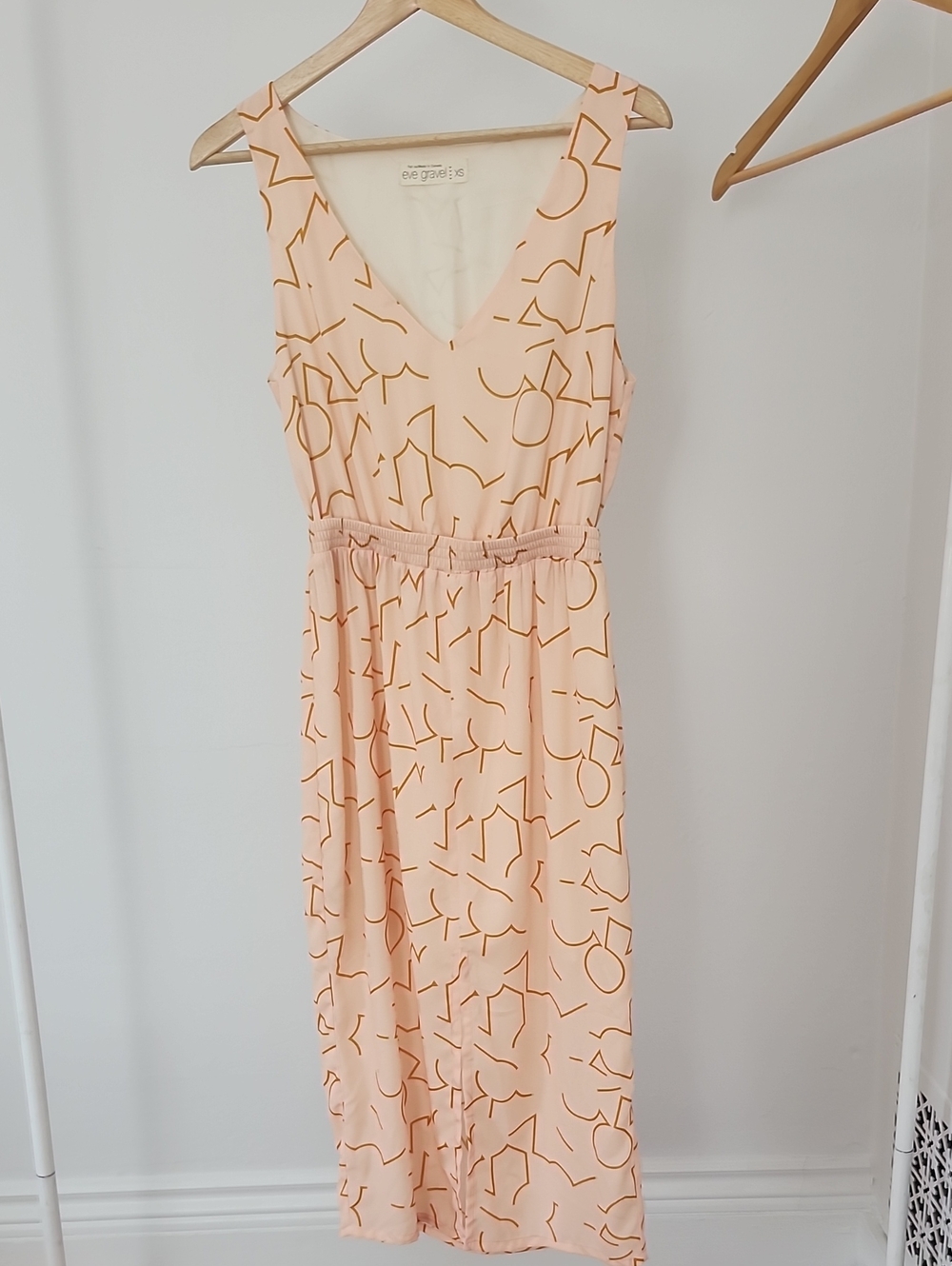 Eve Gravel peach midi dress with abstract mustard line print